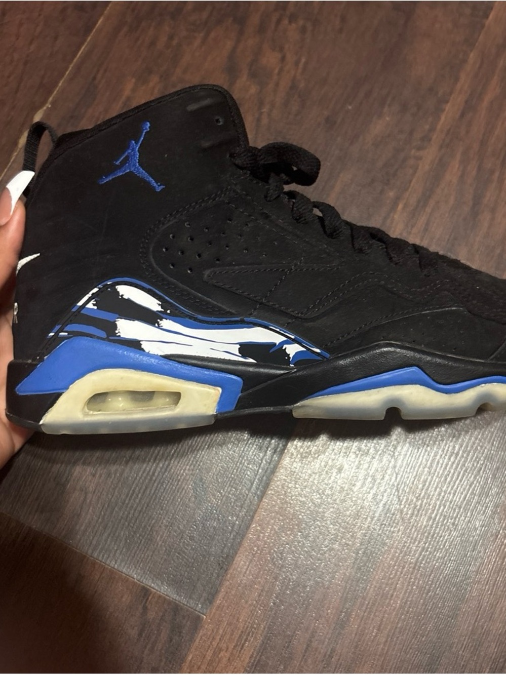 Jordan’s High-Top Sneakers in Black & Royal Blue